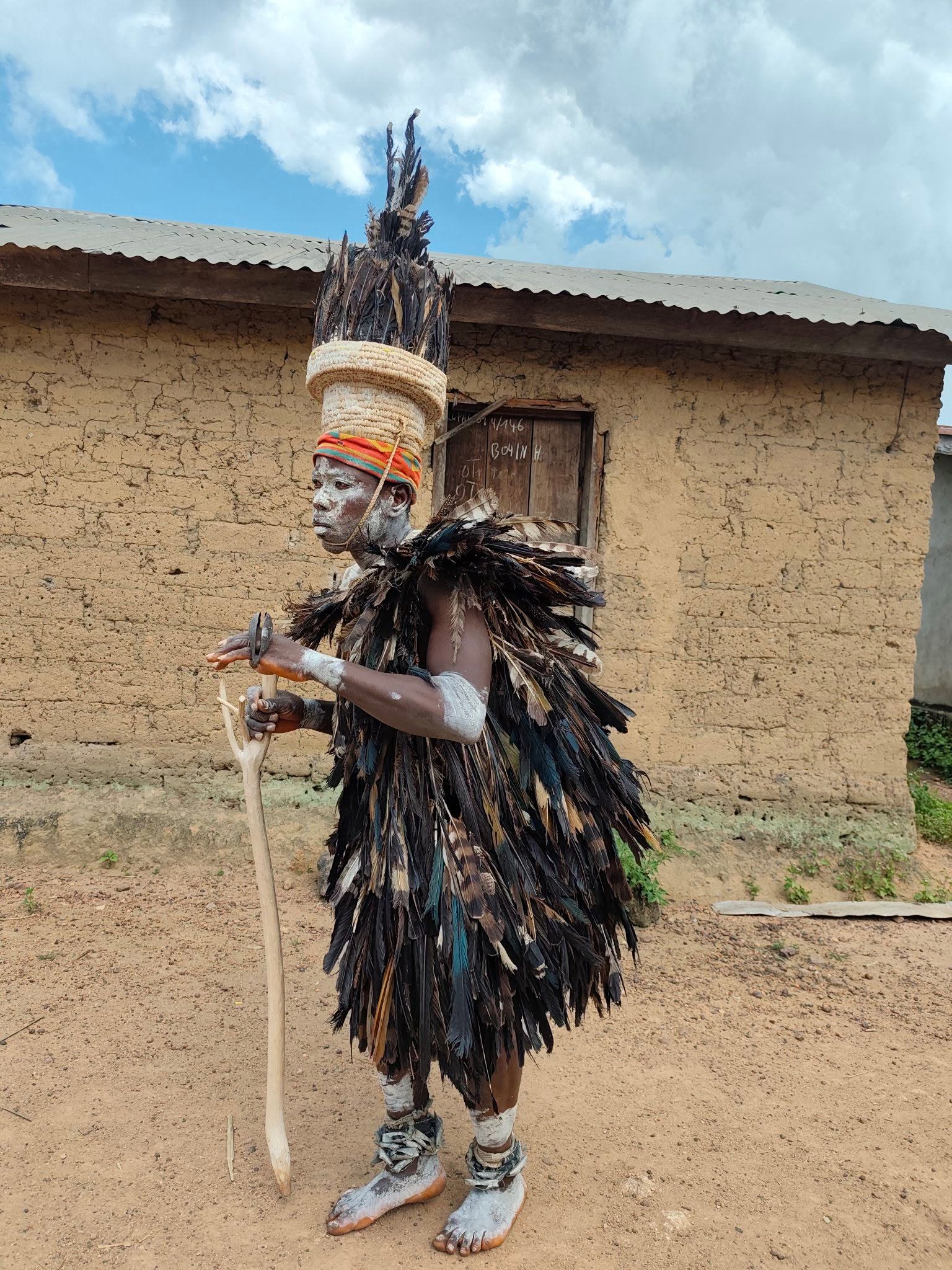 Ceremonial dancer in feathered costume