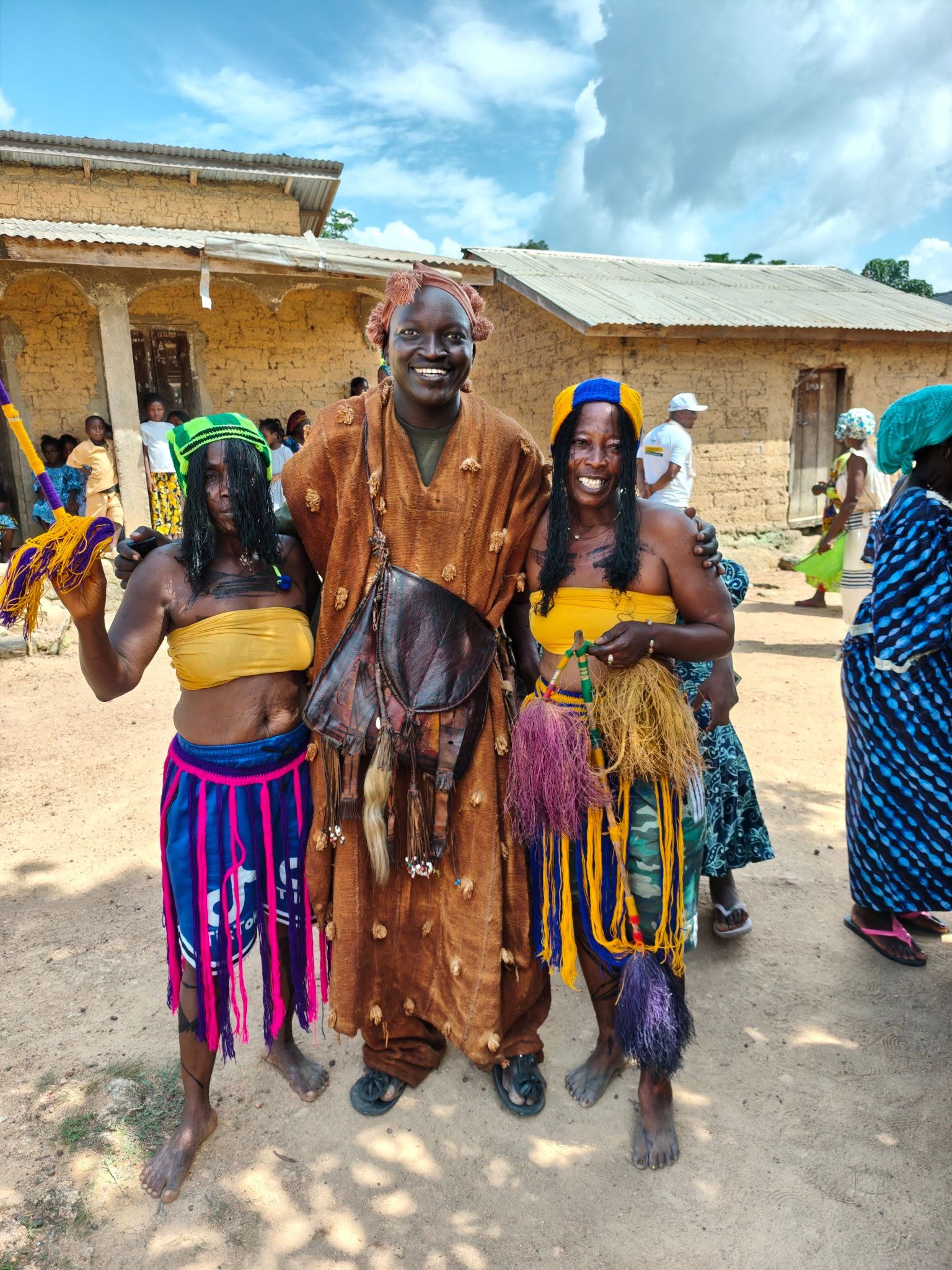 Malian man and women in traditional robes
