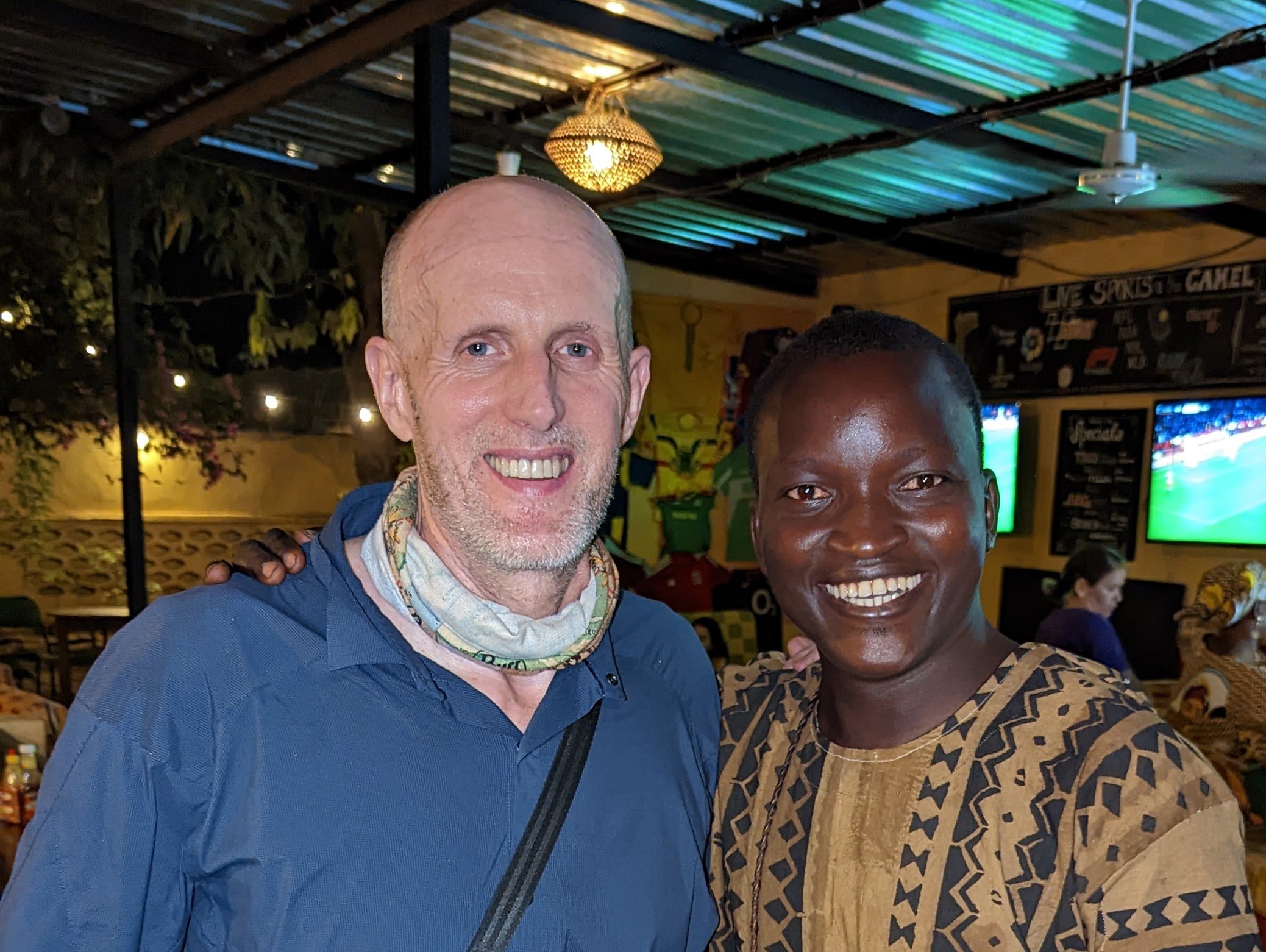 Traveller with a local guide in Bamako, Mali